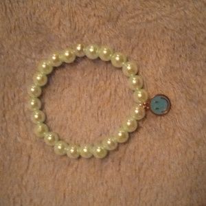 Handmade kids or teens minimalist light blue bracelet with smiley face charm